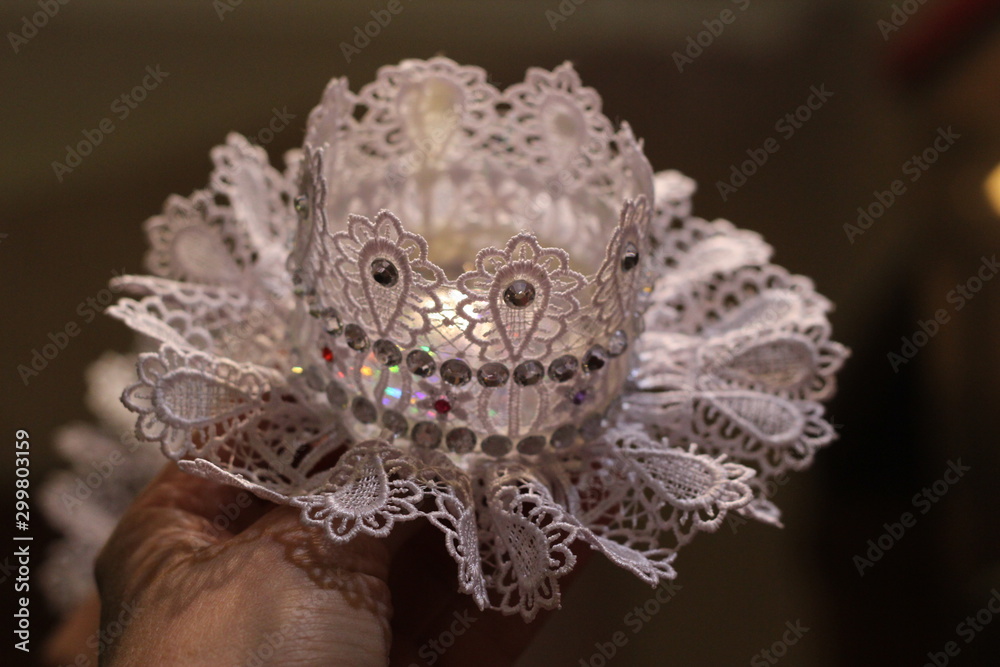 crown of lace with rhinestones in hand crown of lace with rhinestones in hand