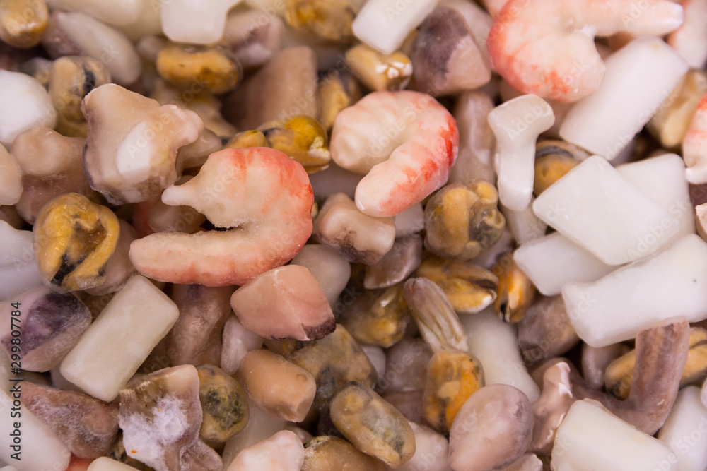 Prawns and shrimps, other seafoods to cook for dinner, lunch or breakfast. Healthy food. Seafood background. Prawns and shrimps, other seafoods to cook for dinner, lunch or breakfast. Healthy food. Seafood background.