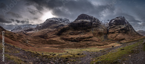 Panoramic view of Highland's Glencoe landscape, three sisters mountains and dramatic cloudy sky. © Andres Conema