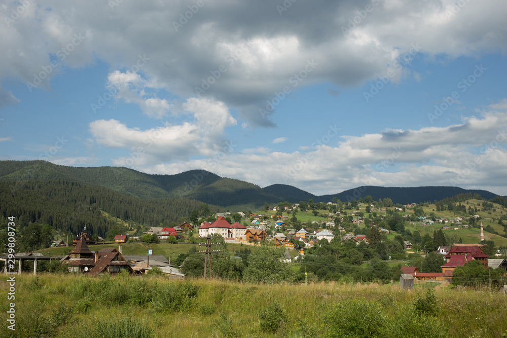 Fototapeta premium Panoramic View of Carpathian Mountains in Summer Sunny Day. Bukovel, Ukraine