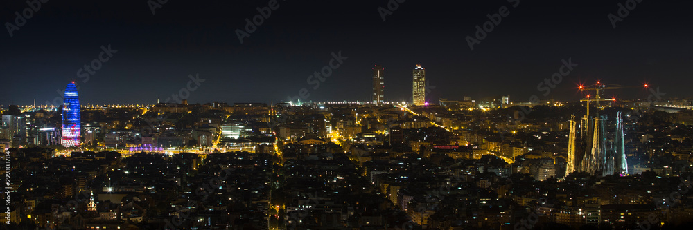 Panoramic view of the city of Barcelona at night.