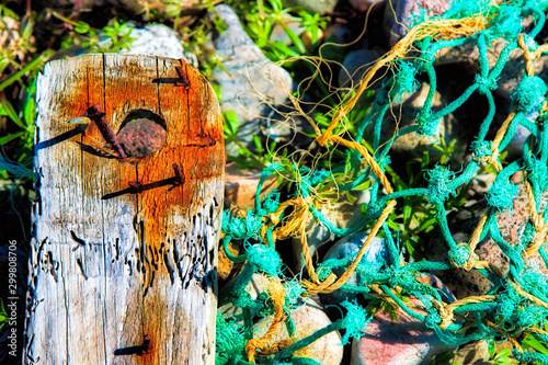 Quadro em tela Wrecked lobster creel on the shore after a storm