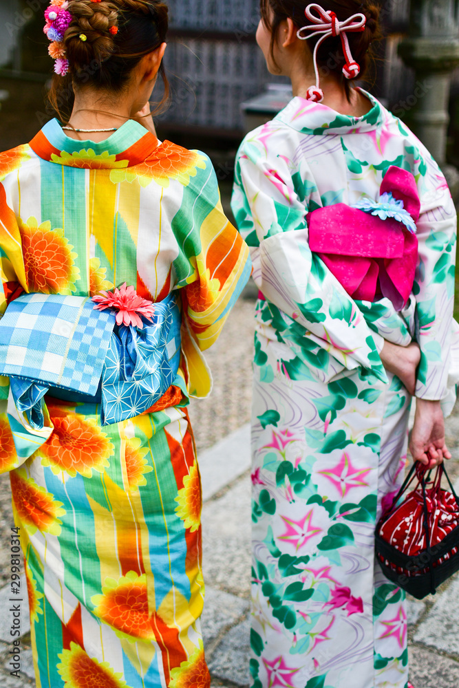 Young women wearing traditional Japanese dress near Kohfukuji Temple, Nara, Honshu, Japan