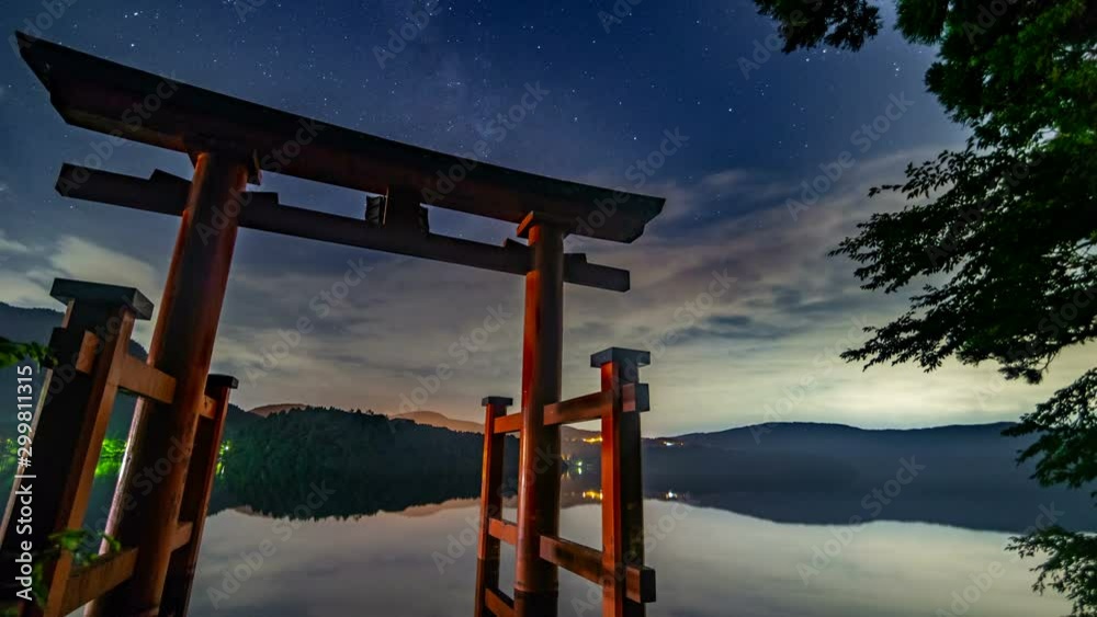 Timelapse of Milky Way over Shinto Torii Gate at Lake in Hakone, Japan Timelapse of Milky Way over Shinto Torii Gate at Lake in Hakone, Japan