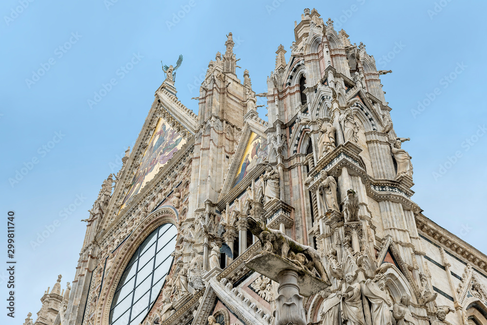 Detail of facade of the cathedral of Siena with Sienese wolf