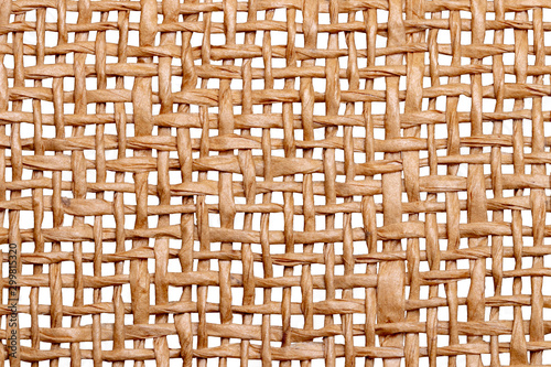Wicker twigs texture isolated. Close-up of a detail of a handmade wicker lamp shade isolated on a white background. Macro. photo