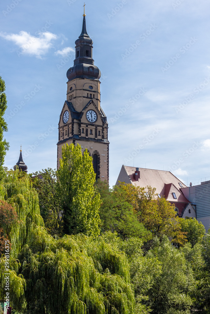 View of historic and modern buildings and churches on the Karl Heine canal in Leipzig / Germany with a newly created bicycle and hiking trail View of historic and modern buildings and churches on the Karl Heine canal in Leipzig / Germany with a newly created bicycle and hiking trail