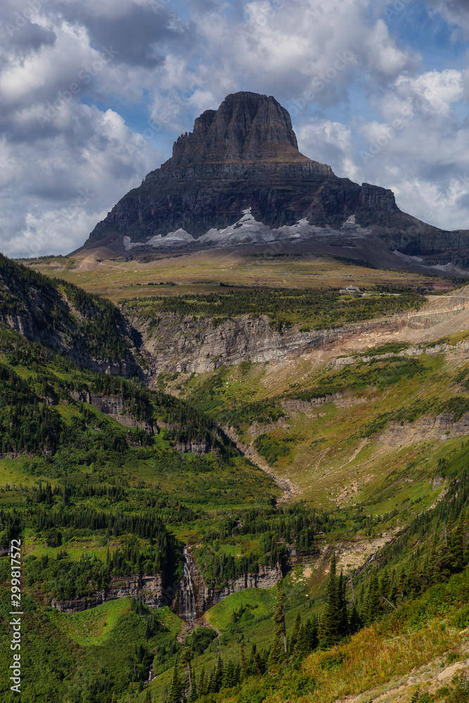 Glacier National Park, Montana, United States. Beautiful Panoramic View of American Rocky Mountain Landscape during a Cloudy Summer Morning. Glacier National Park, Montana, United States. Beautiful Panoramic View of American Rocky Mountain Landscape during a Cloudy Summer Morning.