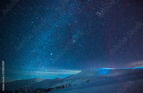 Stunning starry sky in a blue haze photo