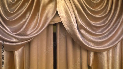 Beautiful theater curtain in gold color