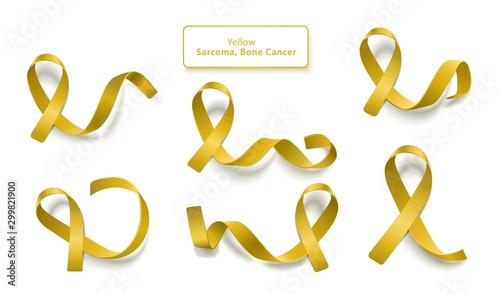 Set of yellow curly ribbons and loops realistic style