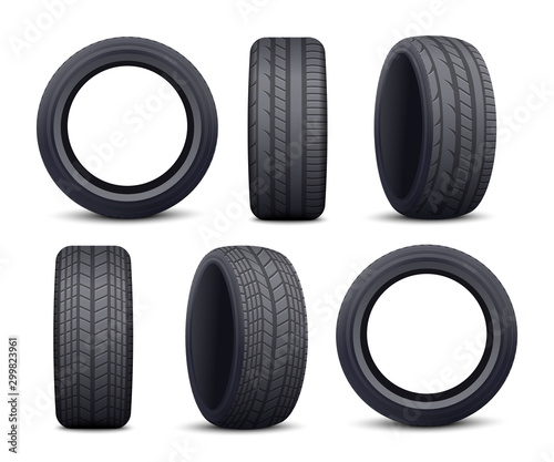 Realistic black car tire set isolated on white background - front and side view