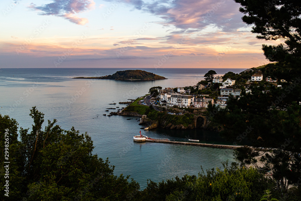 Fototapeta premium Evening light over the Banjo pier, Hannafore and Looe Island