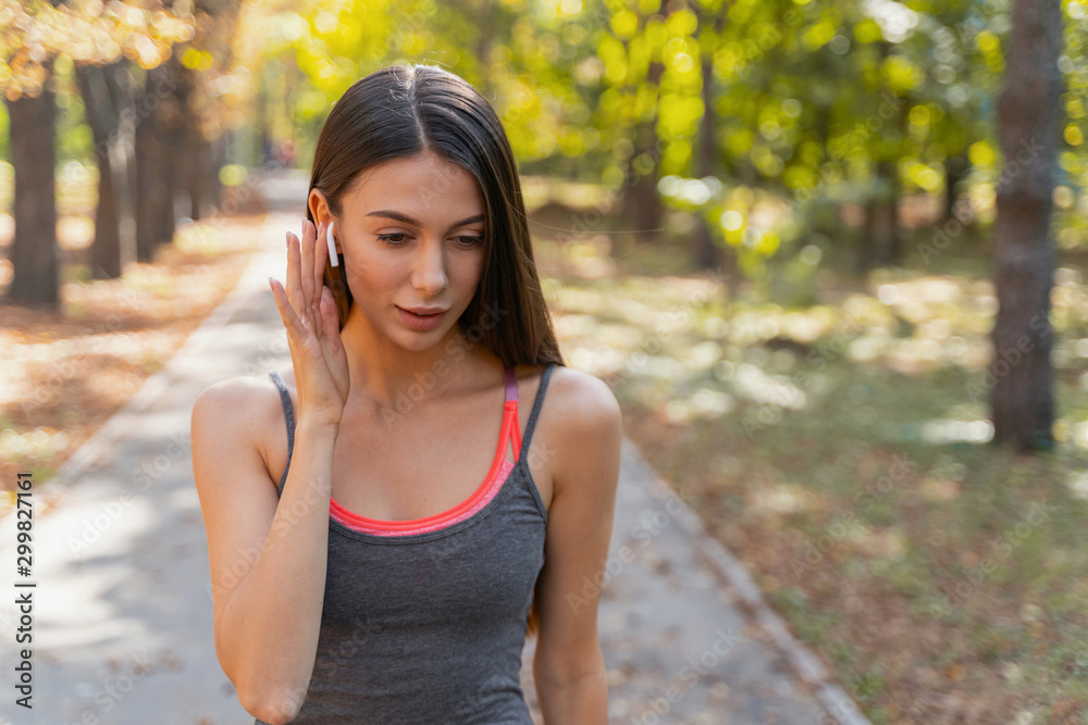 Pretty lady looking for her favorite song