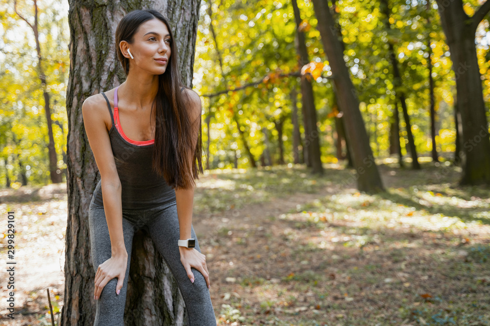 Fototapeta premium Beautiful woman getting ready for the next exercise