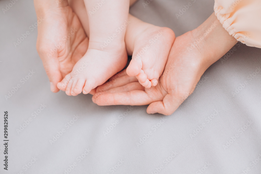 little baby lies parents touch gently legs little baby lies parents touch gently legs