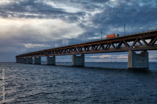 Fototapeta Naklejka Na Ścianę i Meble -  Öresund bridge with truck and sundown 