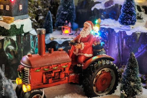 santa claus on tractor in forest