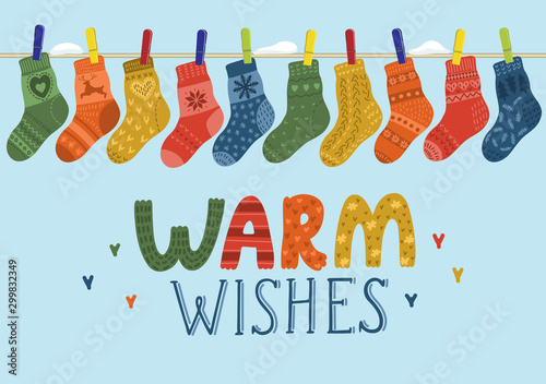 Warm wishes. Wool socks hanging on the rope. Vector illustration