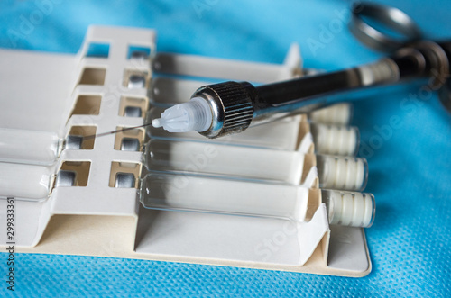 dental syringe and carpules with dental anesthesia, lidocaine articaine mepivacaine novocaine photo
