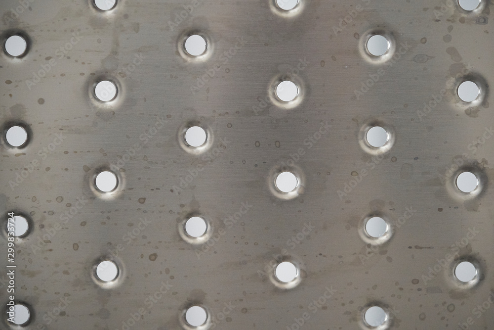 A steel plate with holes