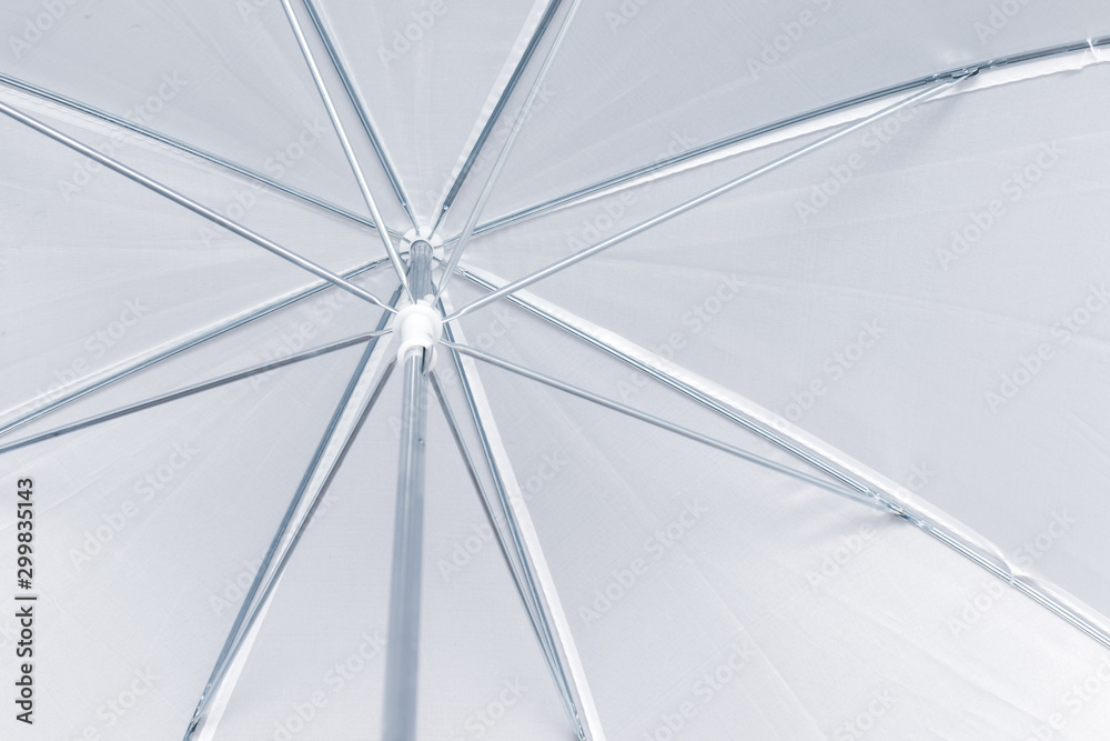 Bright white open umbrella texture background, bottom view Bright white open umbrella texture background, bottom view
