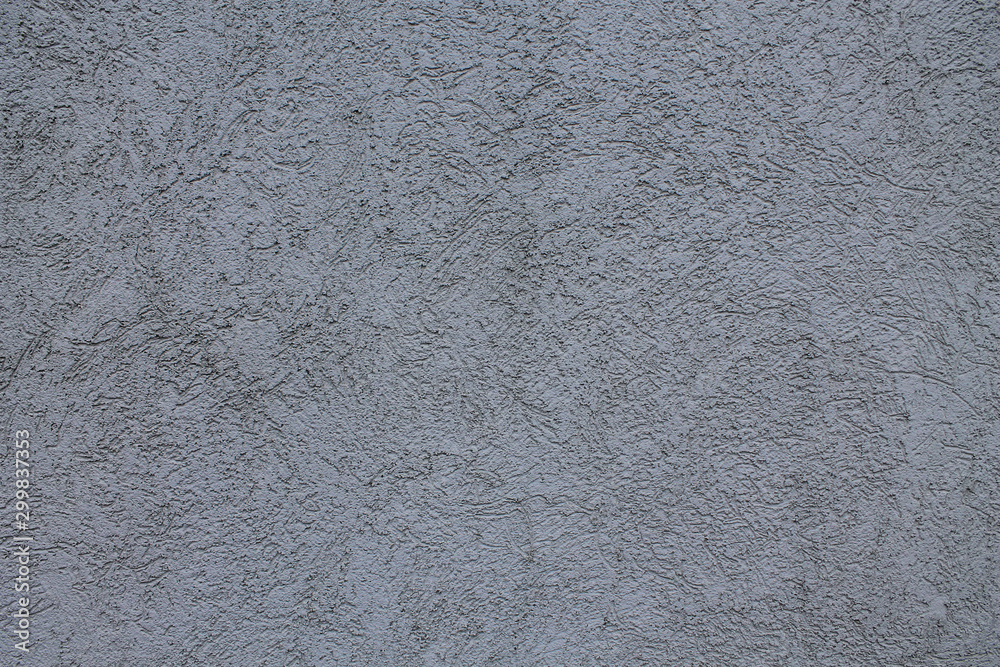Closeup of a gray concrete wall. Natural stucco patterns. Closeup of a gray concrete wall. Natural stucco patterns.