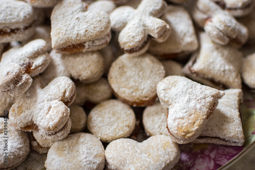 Vanilice (small Vanilla cookies) are bite-sized Serbian Vanilla cookies made as sandwich of two vanilla and walnut cookies held together with a dollop of jam, usually served around the Christmas Vanilice (small Vanilla cookies) are bite-sized Serbian Vanilla cookies made as sandwich of two vanilla and walnut cookies held together with a dollop of jam, usually served around the Christmas