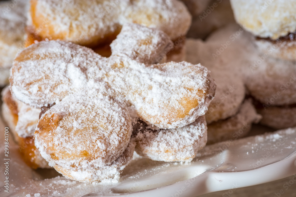 Vanilice (small Vanilla cookies) are bite-sized Serbian Vanilla cookies made as sandwich of two vanilla and walnut cookies held together with a dollop of jam, usually served around the Christmas Vanilice (small Vanilla cookies) are bite-sized Serbian Vanilla cookies made as sandwich of two vanilla and walnut cookies held together with a dollop of jam, usually served around the Christmas