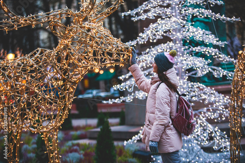 Christmas decorations in the historical center streets of Helsinki, with evening light illumination, concept of Christmas in Finland, with Cathedral, market square, christmas tree photo