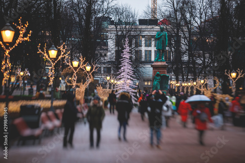 Christmas decorations in the historical center streets of Helsinki, with evening light illumination, concept of Christmas in Finland, with Cathedral, market square, christmas tree photo