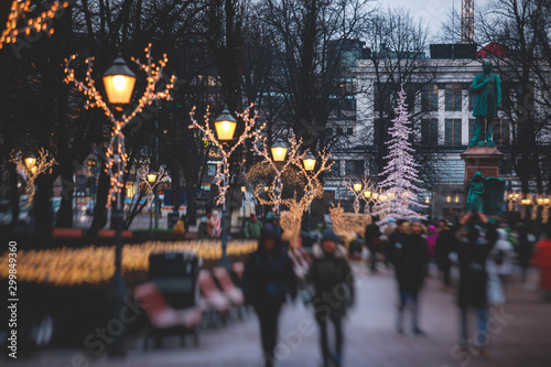 Christmas decorations in the historical center streets of Helsinki, with evening light illumination, concept of Christmas in Finland, with Cathedral, market square, christmas tree photo