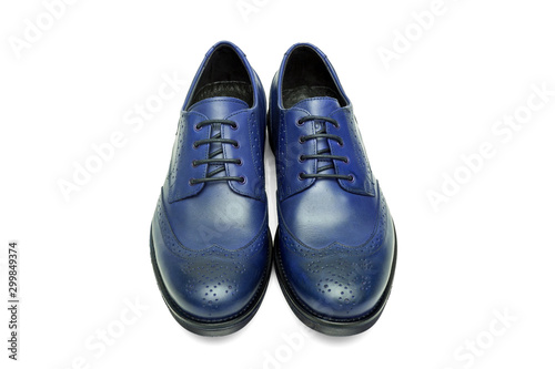 Pair of male cyan and black leather shoes on white background, isolated product, top view.