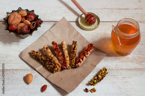 Halawet Al Mawlid Al Nabawi - Collection of traditional candies and sweets with honey jar - Egyptian Culture Dessert usually Eaten During Prophet Muhammad Birth Celebration  photo