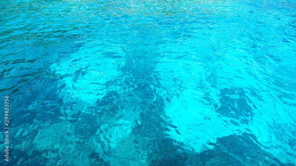 Nature background shot of aqua sea ocean blue water surface