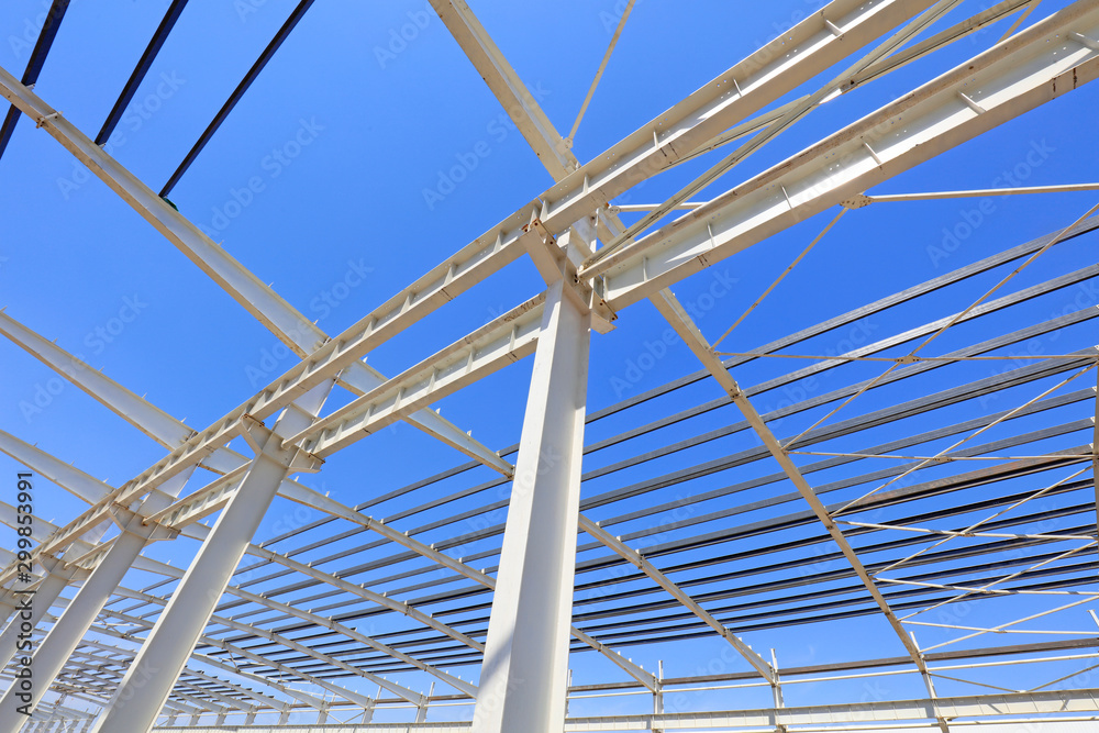 Obraz premium steel girder truss under blue sky