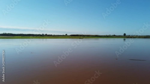 River Travel on Clay Colored Water Madagascar, 