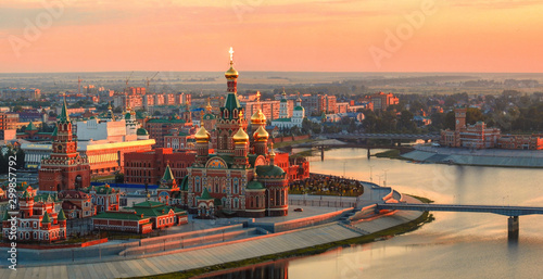 Sunrise top view to center of Yoshkar-Ola city and Kokshaga river embankment. City  wakes up. Yoshkar-Ola is a capital of Mari El republic. in Russian Federation