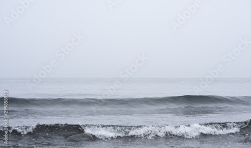 Ocean waves in September, moody misty morning no worries © Ilari