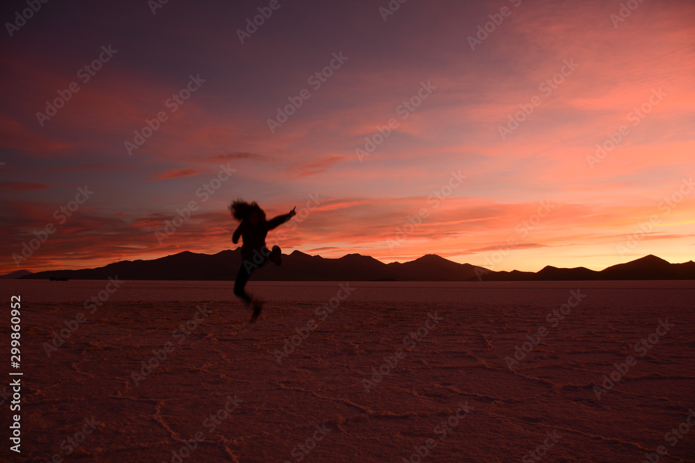 unique sunsets in the salar de uyuni bolivia, heaven and earth with different reddish tones unique sunsets in the salar de uyuni bolivia, heaven and earth with different reddish tones