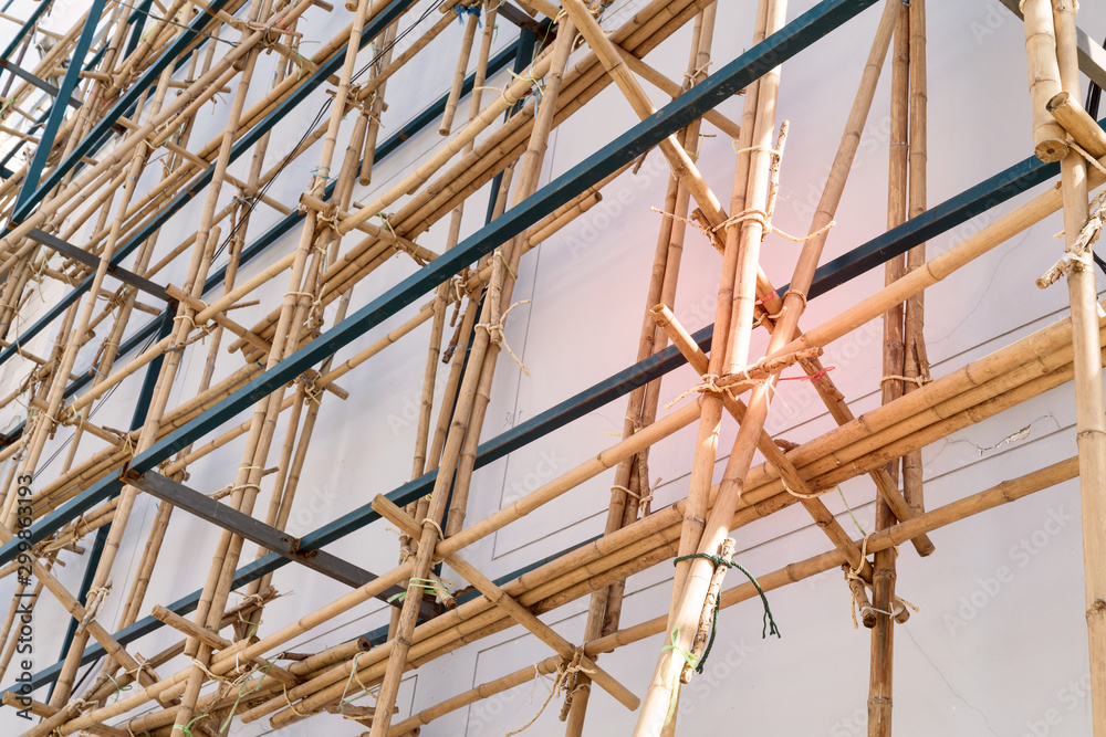 scaffolding at construction with wooden bamboo scaffolding at construction with wooden bamboo