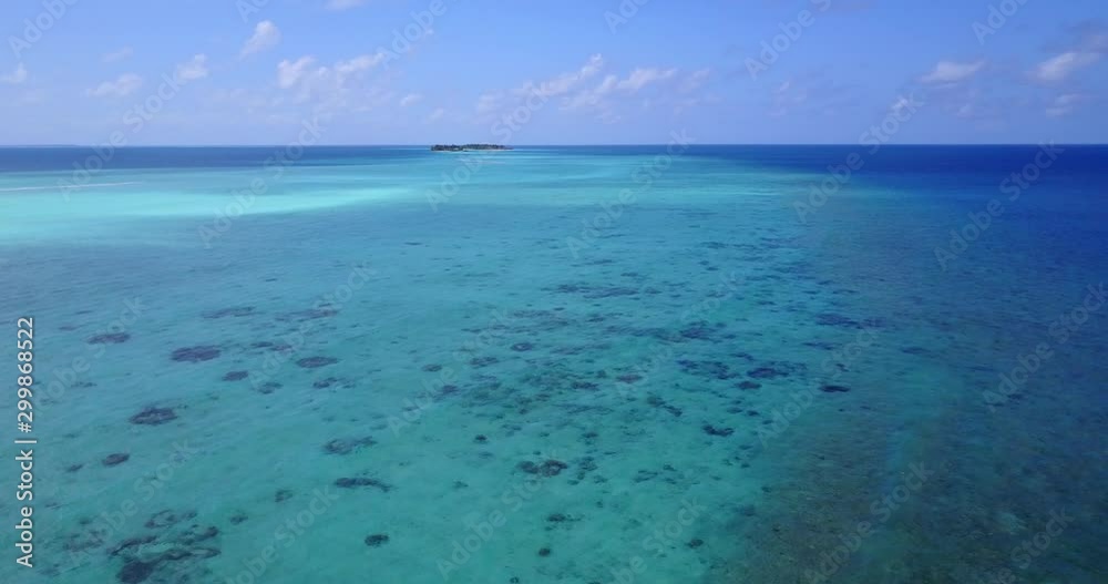 tropical sea with coral reefs, sandbanks and desert islands, dolly in aerial tropical sea with coral reefs, sandbanks and desert islands, dolly in aerial