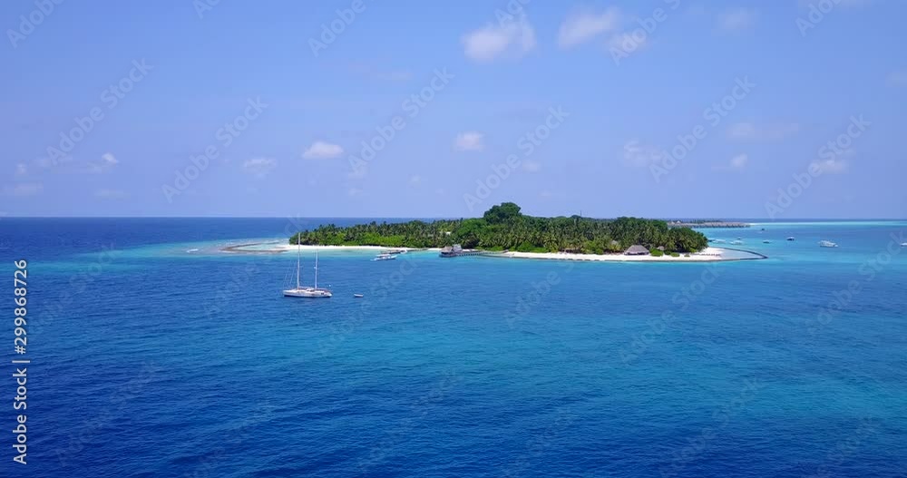 modern sailing yacht moored near the tropical island, Cook Island In Kiritimati modern sailing yacht moored near the tropical island, Cook Island In Kiritimati