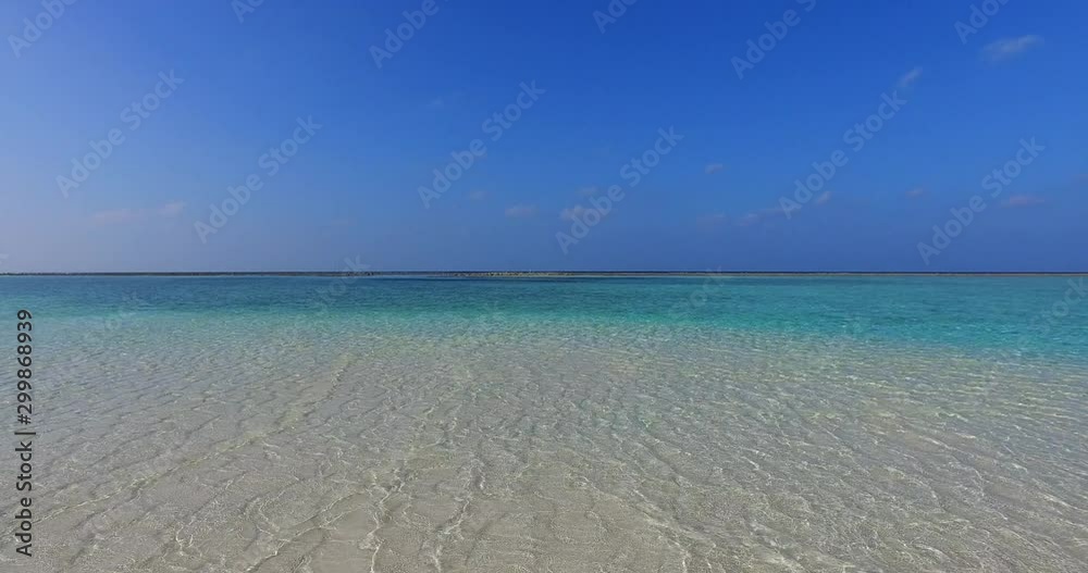 astonishing surreal horizon crystal clear turquoise water on white sand meeting clear blue sky astonishing surreal horizon crystal clear turquoise water on white sand meeting clear blue sky