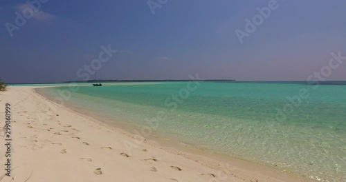 beautiful crystal clear water of Philippine sea with distant uninhabited desert island background photo