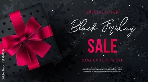 Black Friday Sale banner, poster, flyer design with gift box on black background with sparkles and a texture of snowflakes. Modern design template for advertisement, social and fashion ads
