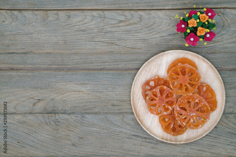 boiled bael fruits in syrup on wooden table,Thai desserts,Aegle marmelos,top view