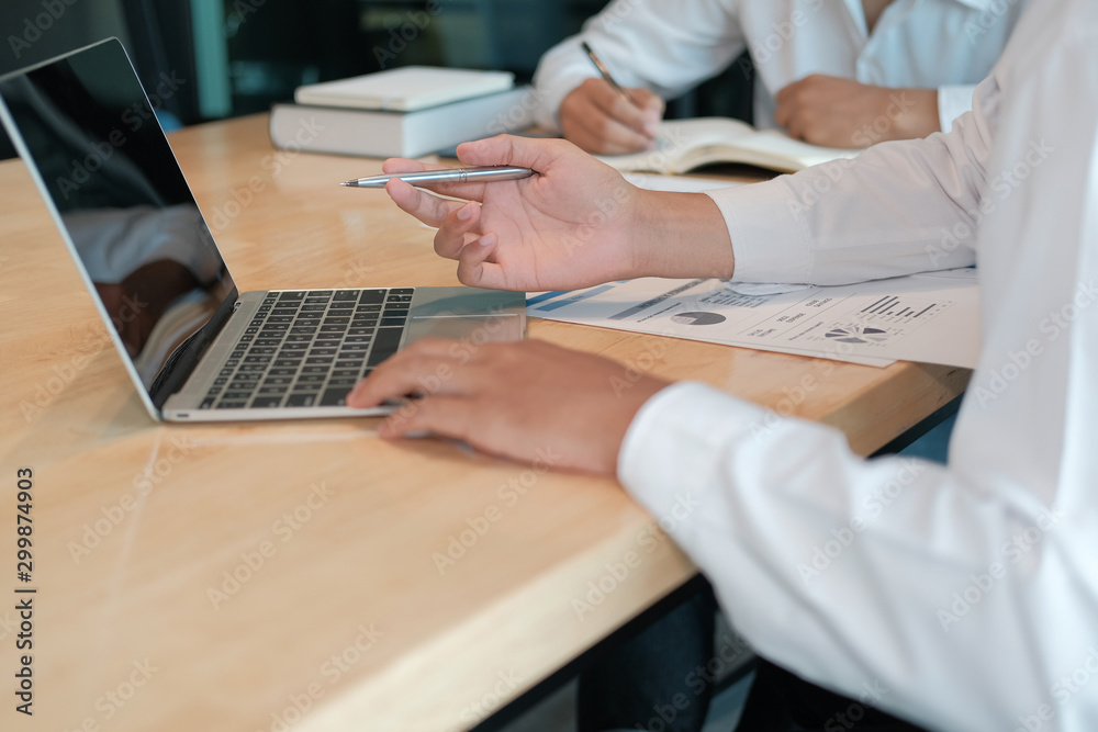 financial adviser analyzing performance revenue with investor. business people discussing in meeting. businessman working with team financial adviser analyzing performance revenue with investor. business people discussing in meeting. businessman working with team