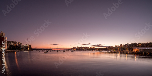 apartments and boats on the bay at dawn