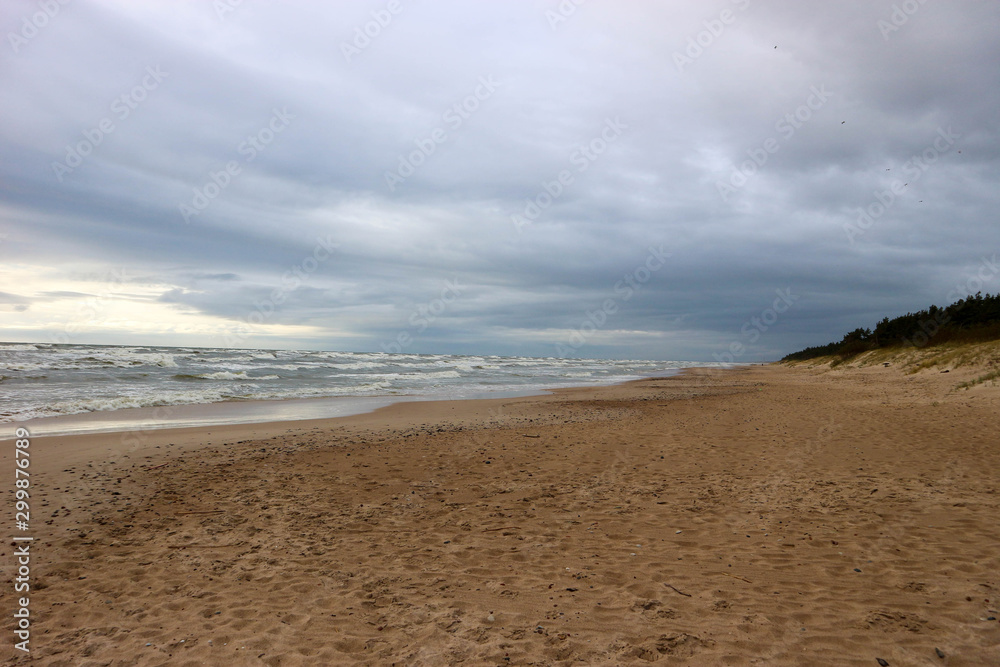 Stormy weather on the baltic sea beach with beautiful clouds Stormy weather on the baltic sea beach with beautiful clouds